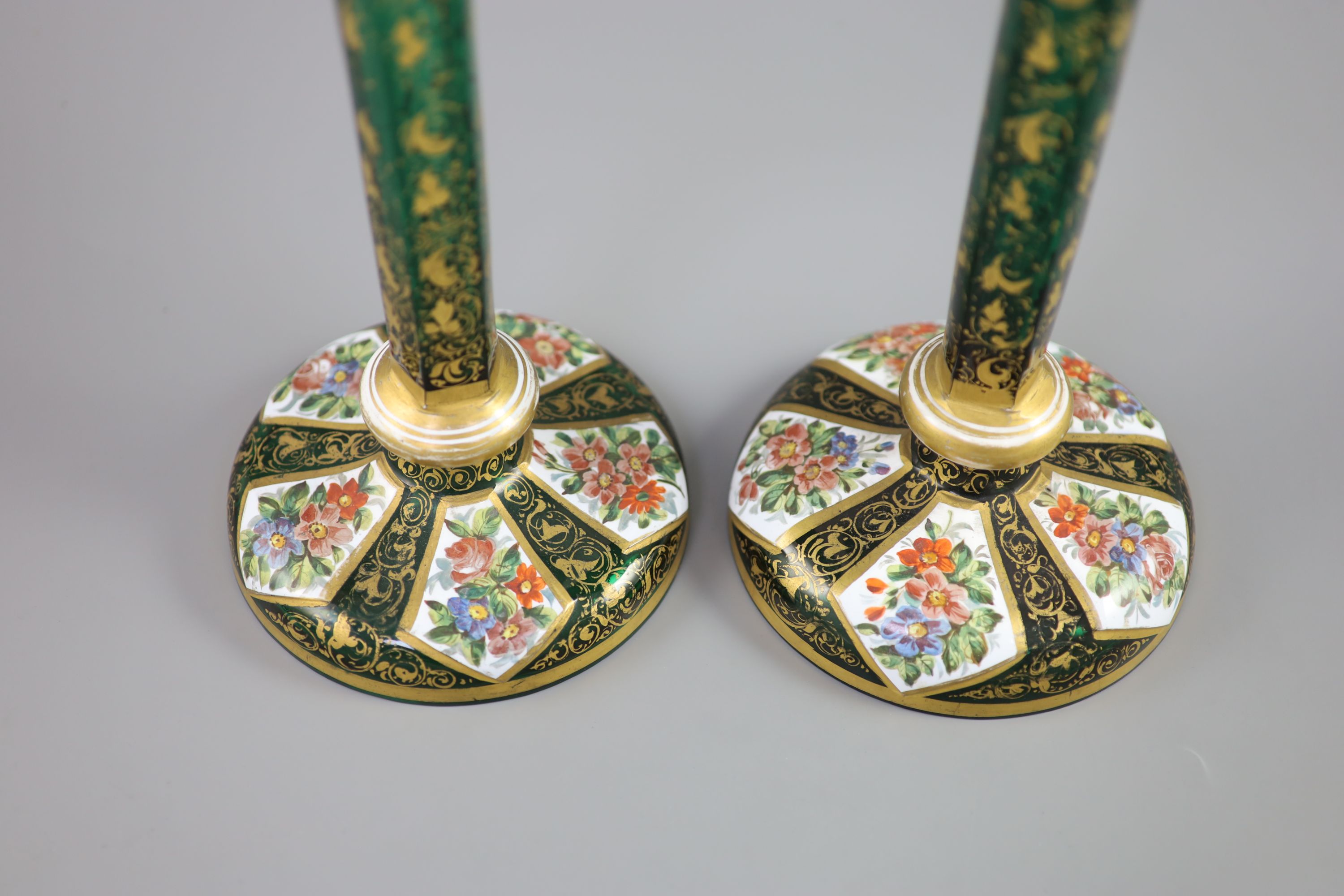 A pair of Bohemian enamelled white overlaid green glass vases, late 19th century, 31cm high